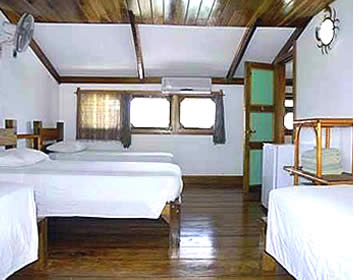 The rooms at Hotel Cala Luna are simple yet elegant